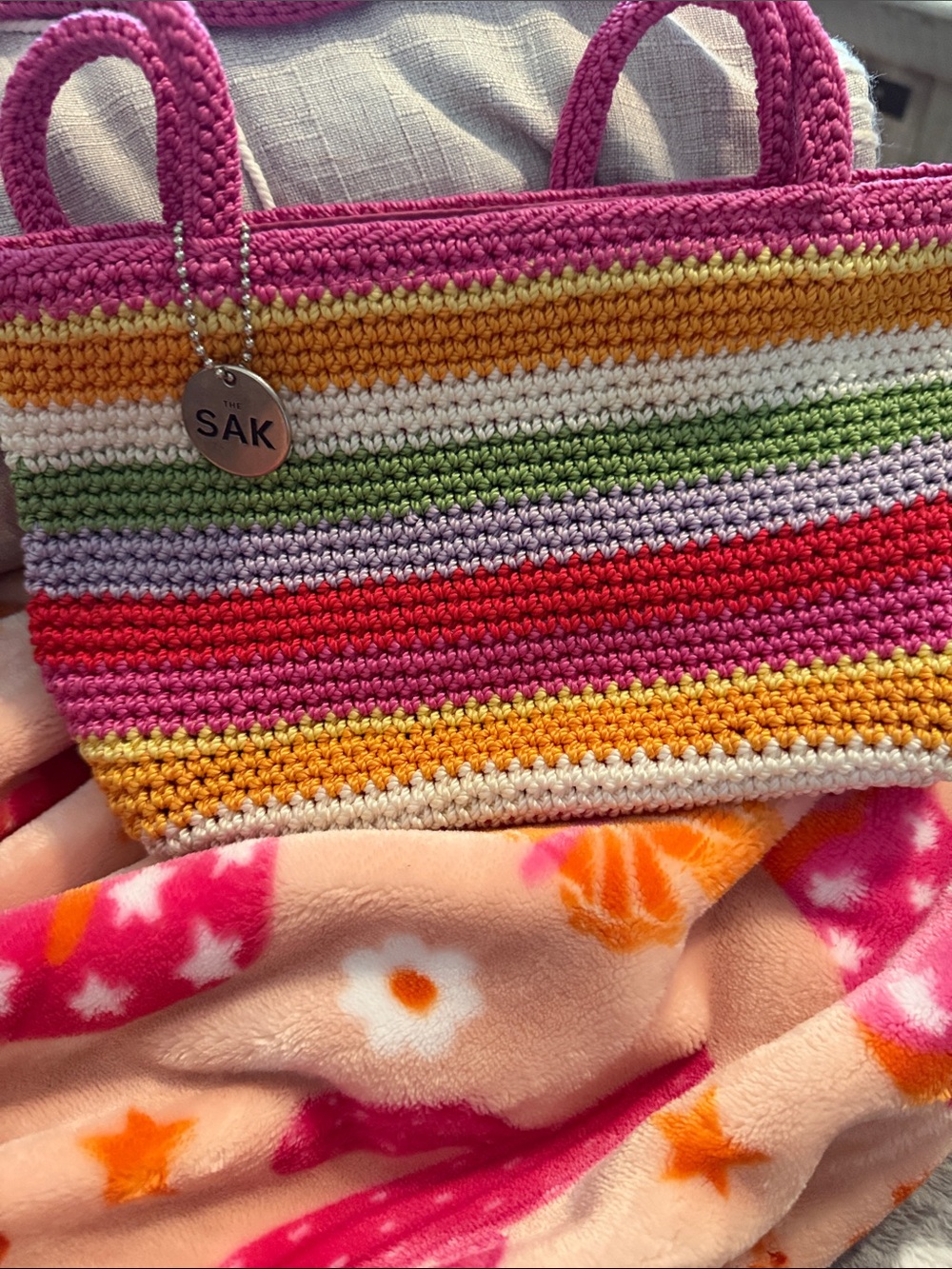 The Sak Multicolor Striped Crochet Tote with Pink Handles